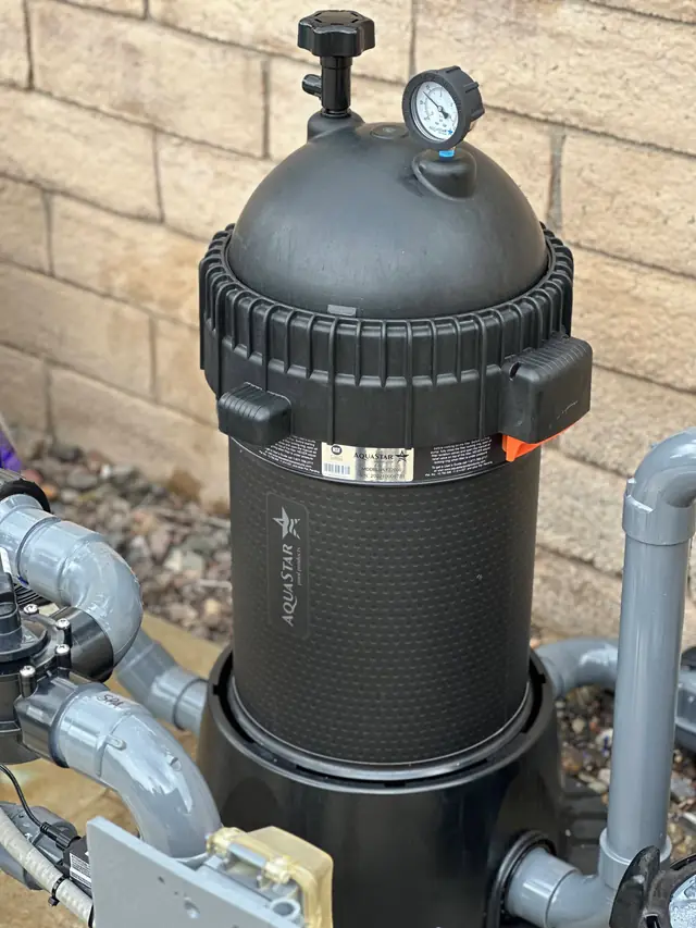 A Pipeline Filter installed against a brick wall